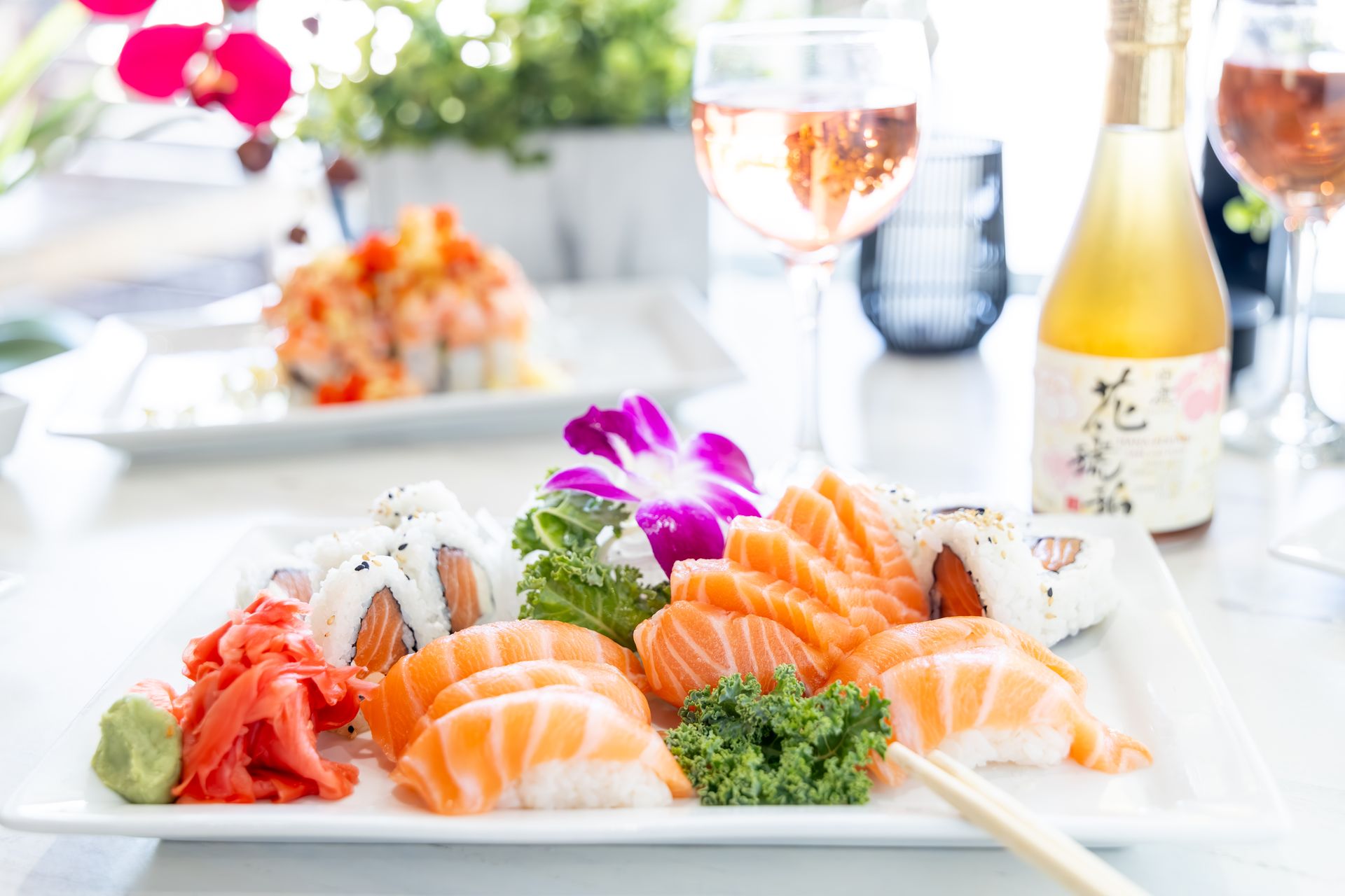 Fresh salmon nigiri, sushi rolls and rosé at Sumo Sushi in Boca Raton